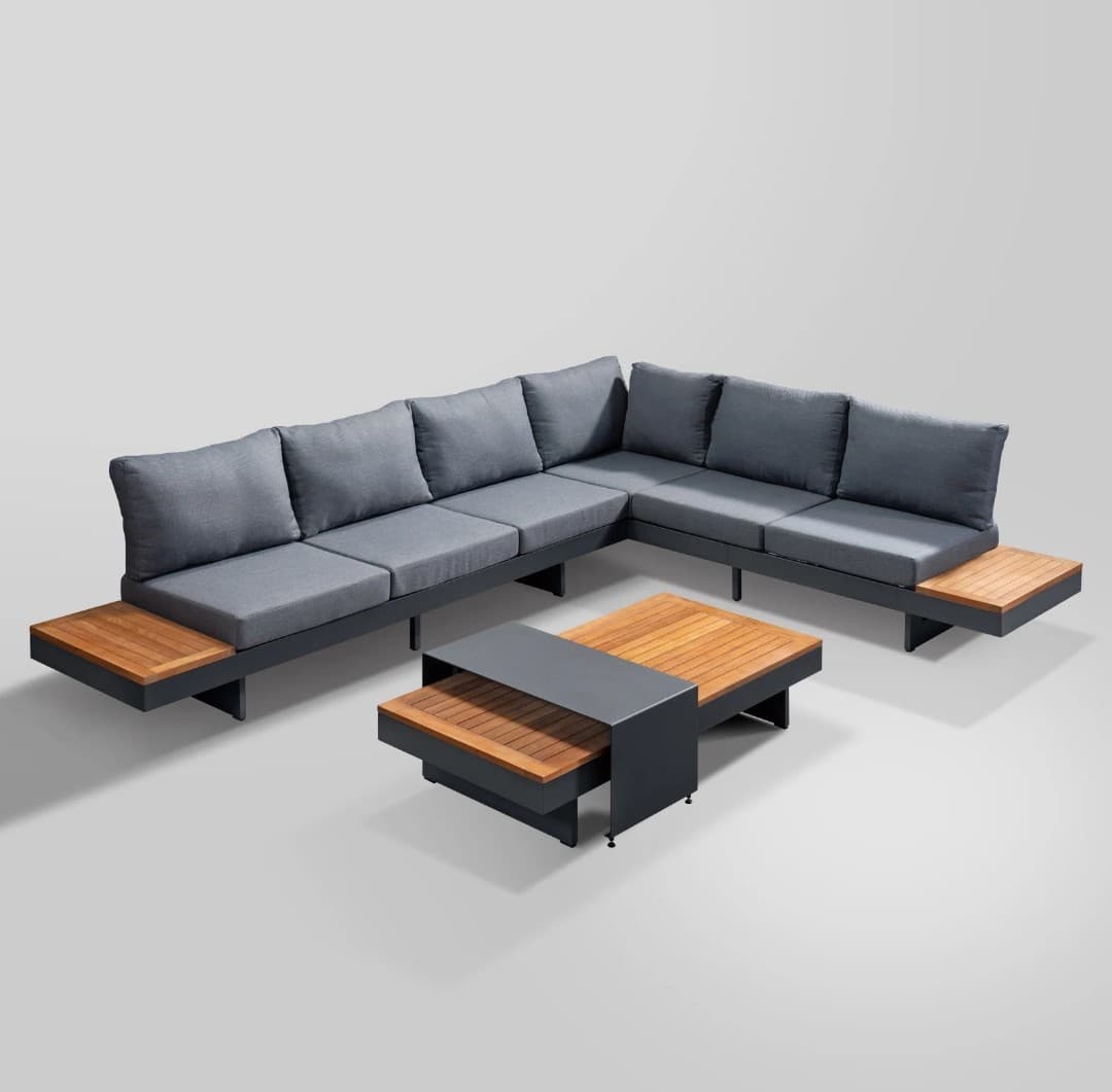 L-shaped outdoor sectional with grey cushions, black frame, wooden side tables, and coffee table.